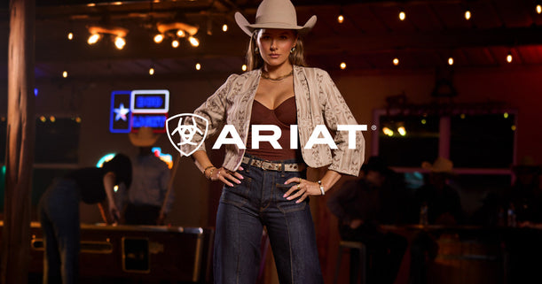 Woman wearing Ariat Clothing indoor setting
