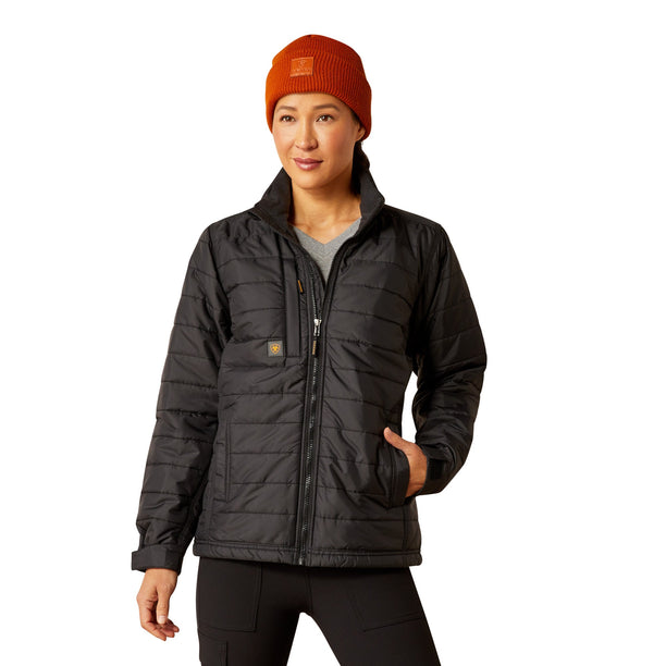 Person wearing a black jacket and orange beanie on a white background