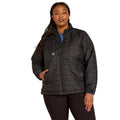 Woman wearing a black quilted jacket on a white background