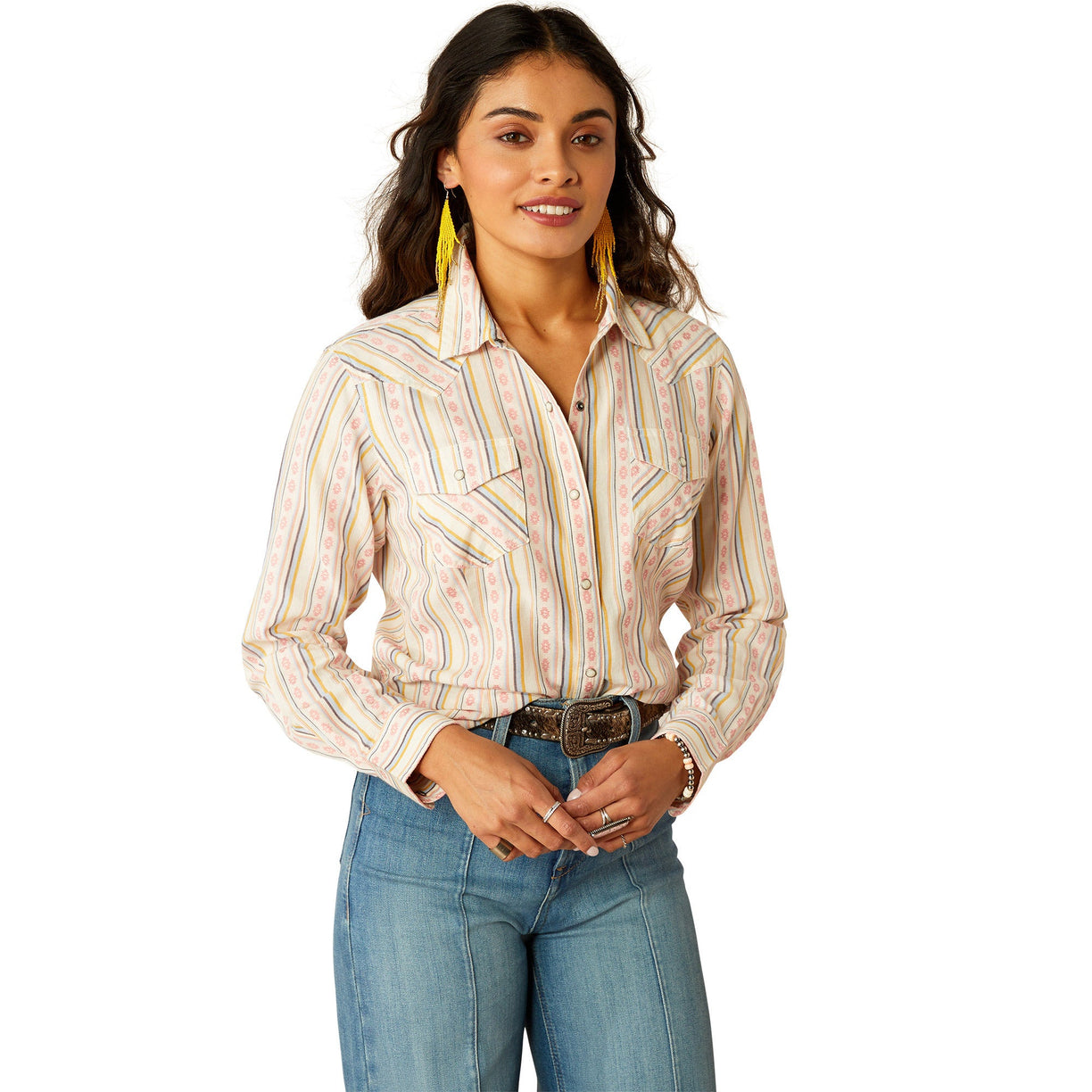 Woman wearing a patterned shirt, jeans, and a cowboy hat on a white background