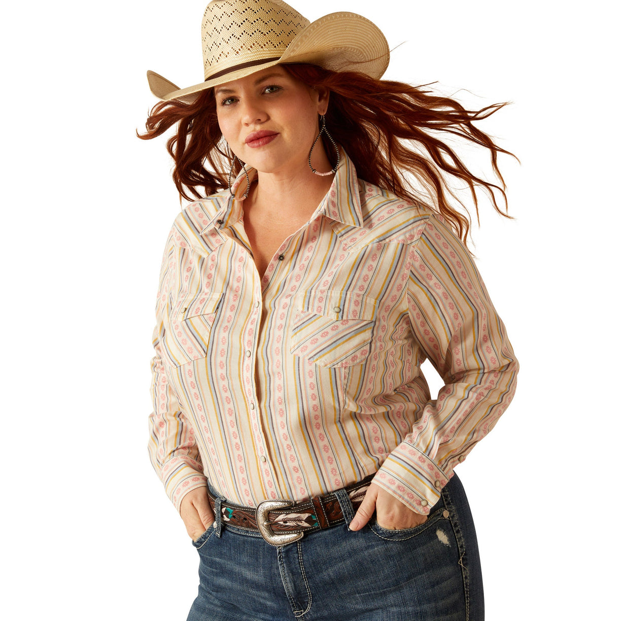 Woman wearing a patterned shirt, jeans, and a cowboy hat on a white background