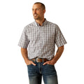 Man wearing a plaid short-sleeve shirt and jeans on a white background