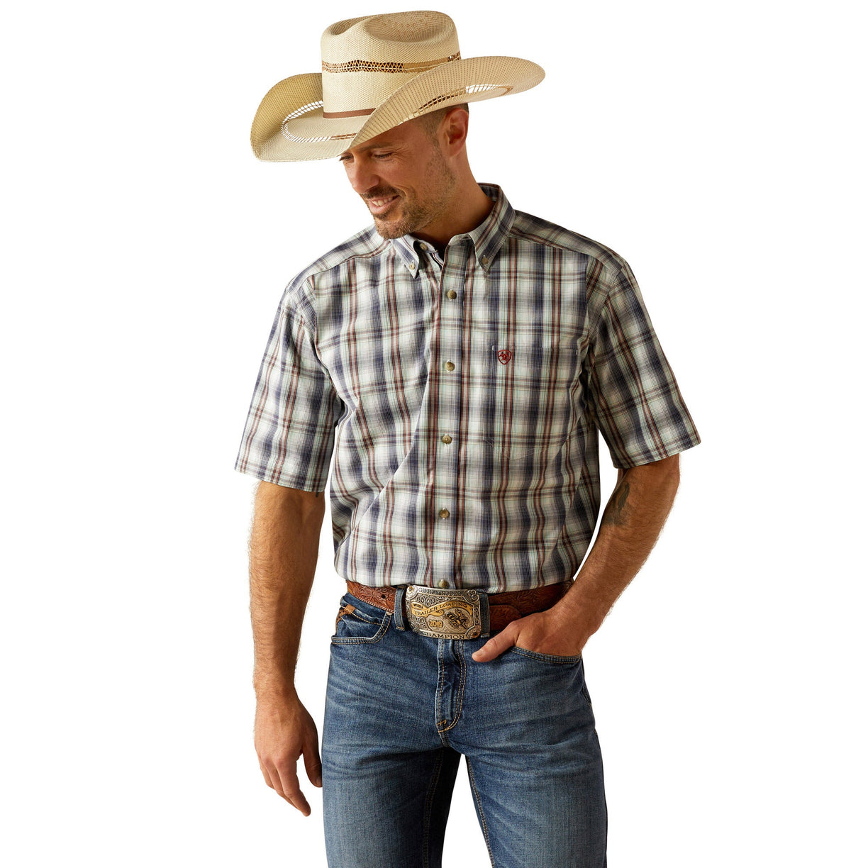 Man wearing a plaid shirt, jeans, and a cowboy hat on a white background