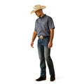 Man wearing a checkered shirt, jeans, and a cowboy hat on a white background