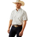Man wearing a plaid shirt, cowboy hat, and jeans on a white background