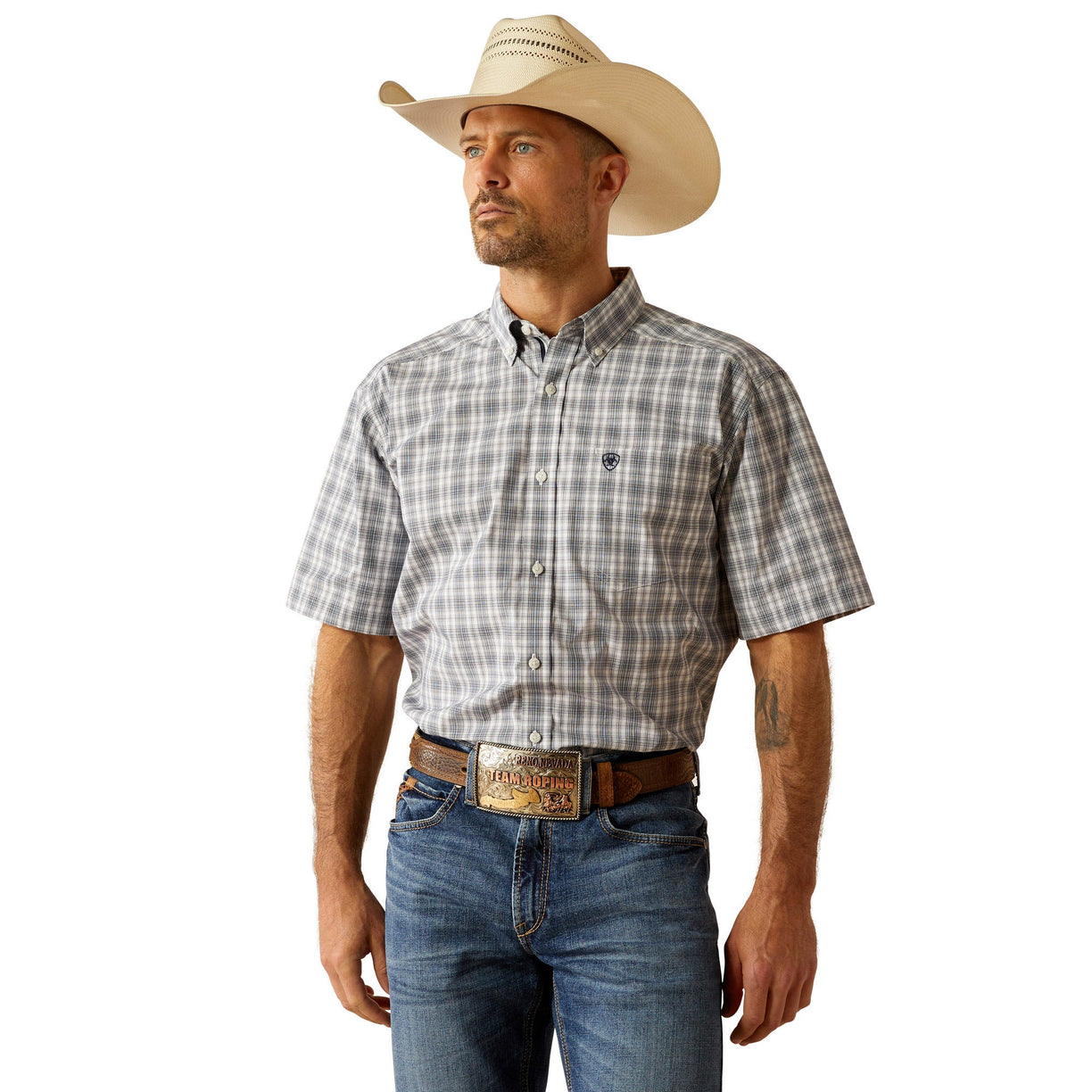 Man wearing a plaid shirt, jeans, and a cowboy hat on a white background