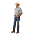 Man wearing a plaid shirt, jeans, and a cowboy hat on a white background