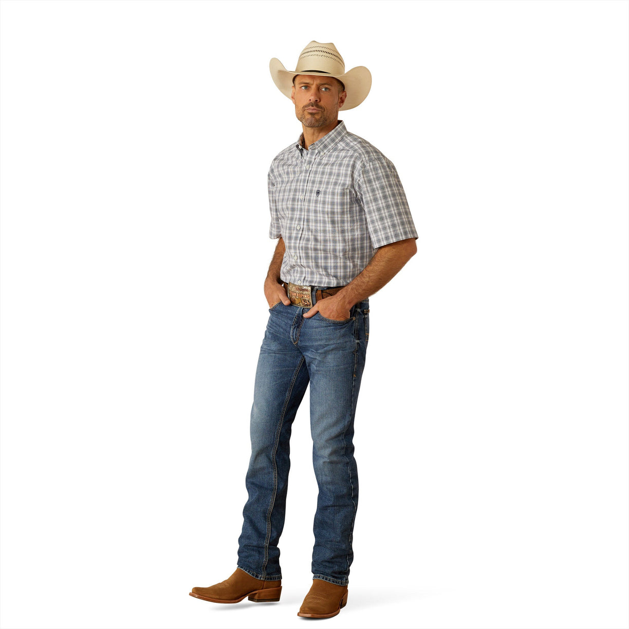 Man wearing a plaid shirt, jeans, and a cowboy hat on a white background