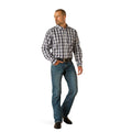 Man wearing a plaid shirt and jeans on a white background
