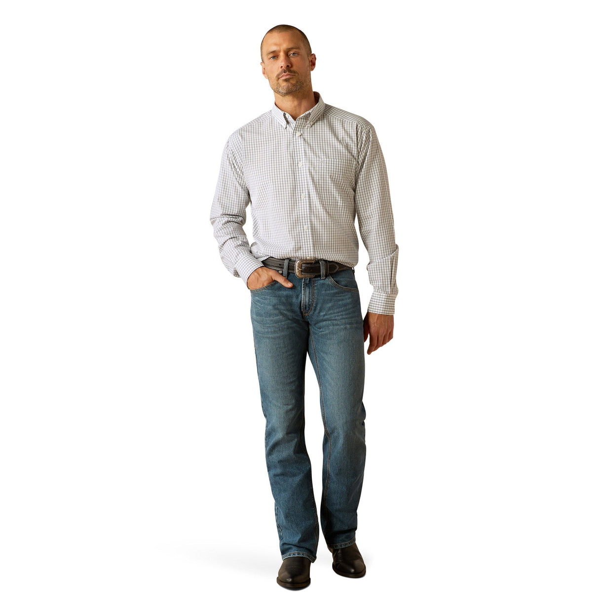 Man wearing a checkered shirt and jeans on a white background
