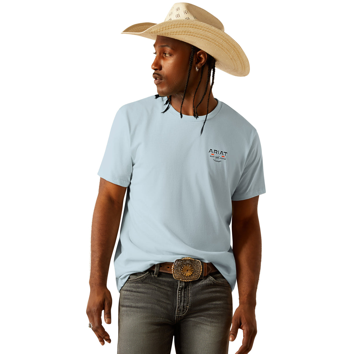 Person wearing a light blue t-shirt with a logo and a straw hat on a white background