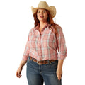 Woman wearing a pink plaid shirt, blue jeans, and a cowboy hat on a white background
