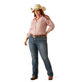 Woman wearing a plaid shirt, jeans, and a cowboy hat on a white background