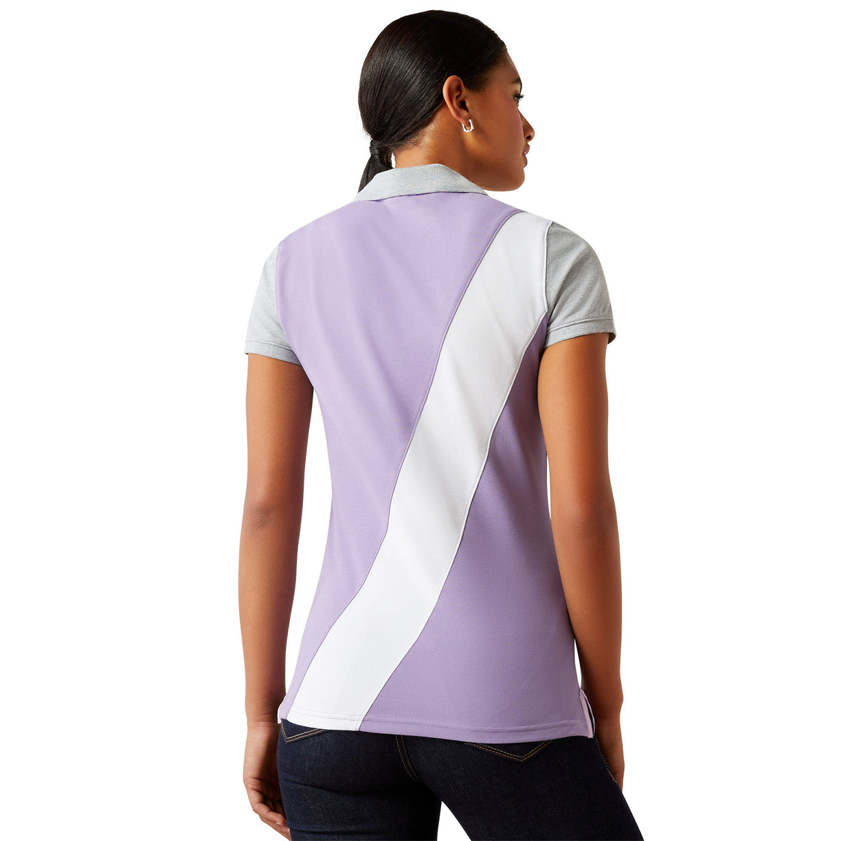 Woman wearing a purple and white striped polo shirt with 'Ariat' branding on a white background