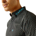 Patterned shirt with Ariat logo on collar and chest, on a white background