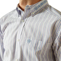 Close-up of a striped shirt with a brand logo on a white background