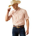 Man wearing a pink striped shirt, blue jeans, and a cowboy hat on a white background