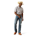 Man wearing a plaid shirt, jeans, cowboy boots, and a straw hat on a white background