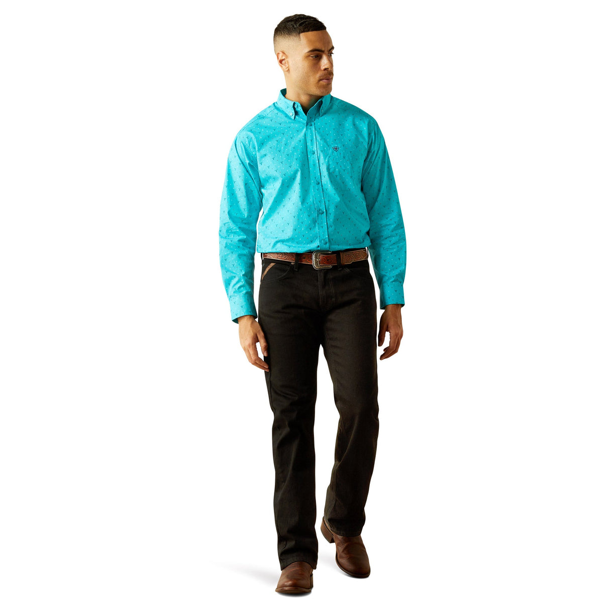 Man wearing a bright blue shirt and dark pants on a white background