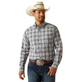 Man wearing a plaid shirt, jeans, and a cowboy hat on a white background