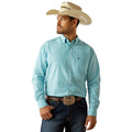 Man wearing a light blue checkered shirt, dark jeans, and a straw cowboy hat on a white background