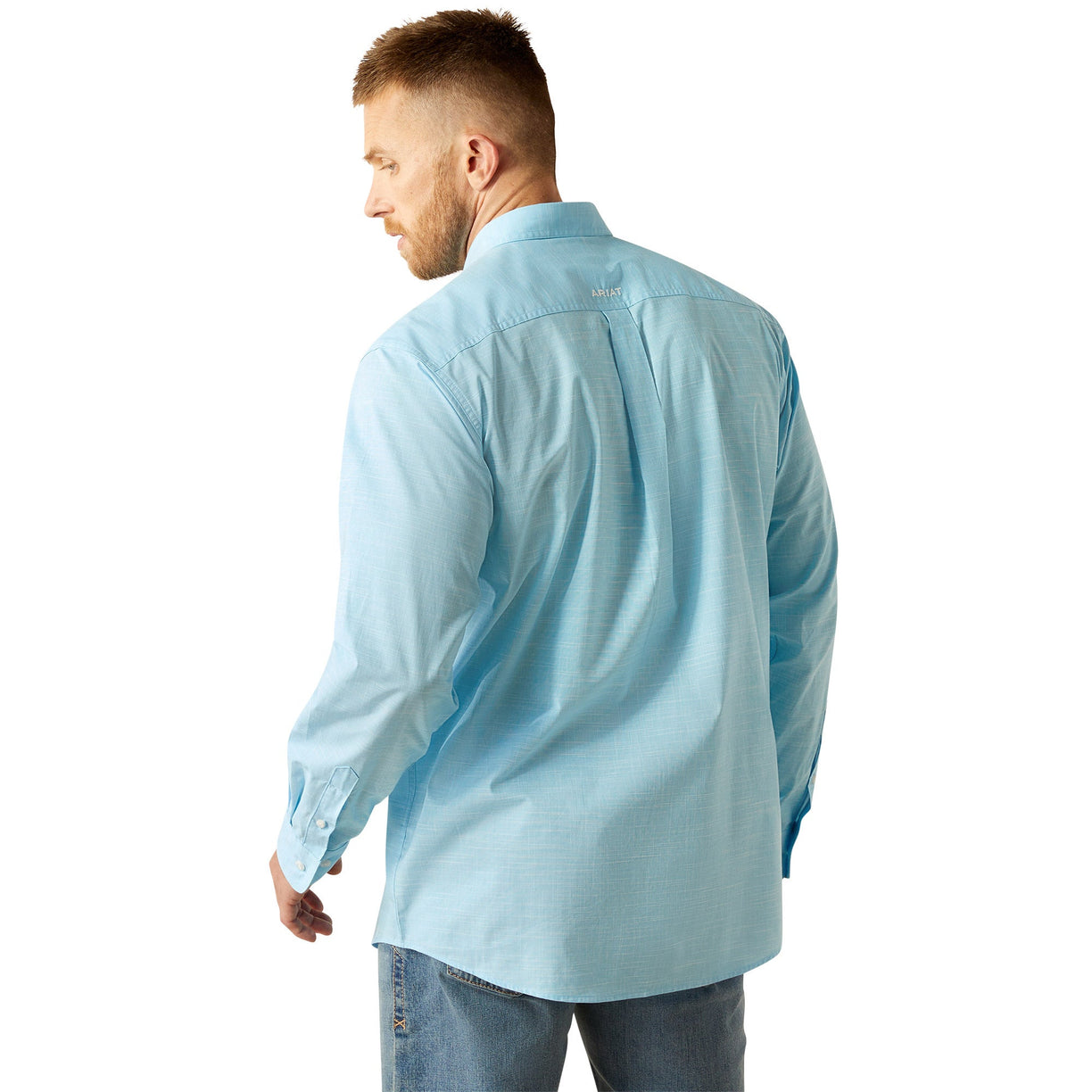 Man wearing a light blue shirt on a white background