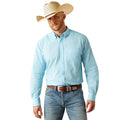 Man wearing a light blue shirt, jeans, and a cowboy hat on a white background