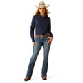 Woman wearing a navy blue shirt, jeans, and a cowboy hat on a white background