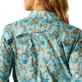 Close-up of a floral patterned shirt with a blurred background