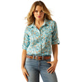 Woman wearing a floral shirt and jeans on a white background
