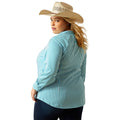 Woman wearing a blue striped shirt and cowboy hat on a white background