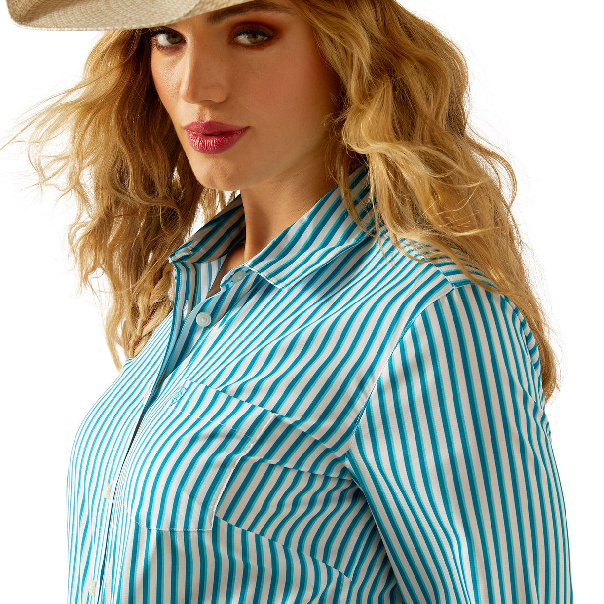 Woman wearing a blue and white striped shirt with a beige hat on a white background