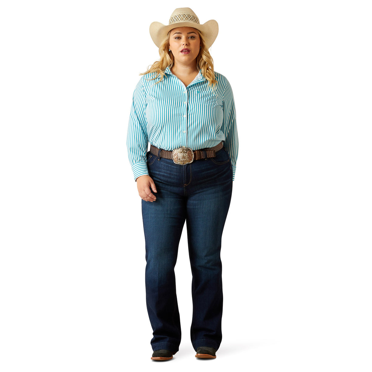 Woman wearing a light blue striped shirt, dark jeans, and a cowboy hat on a white background
