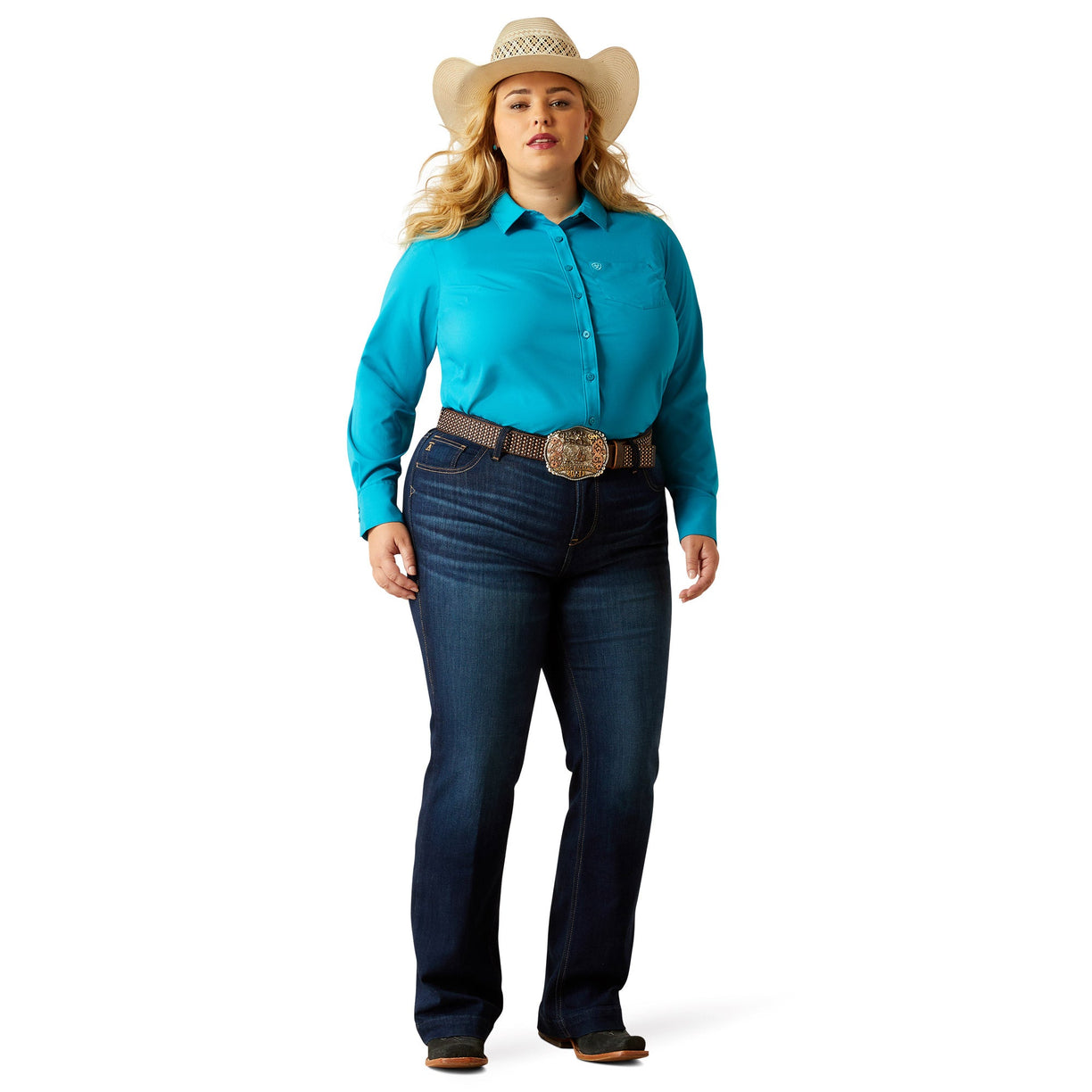 Woman wearing a turquoise shirt, blue jeans, and a cowboy hat on a white background