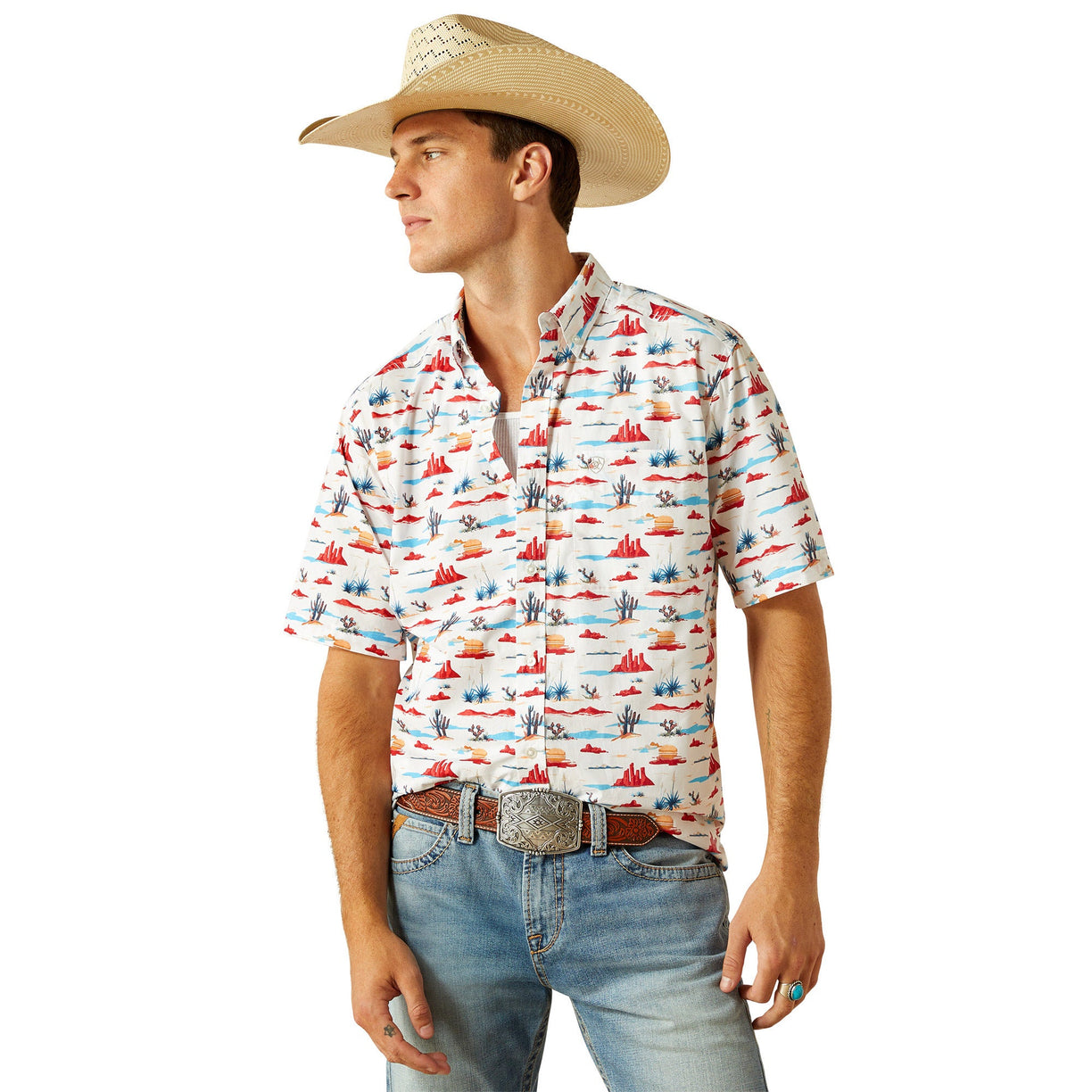 Man wearing a patterned shirt, jeans, and a cowboy hat on a white background