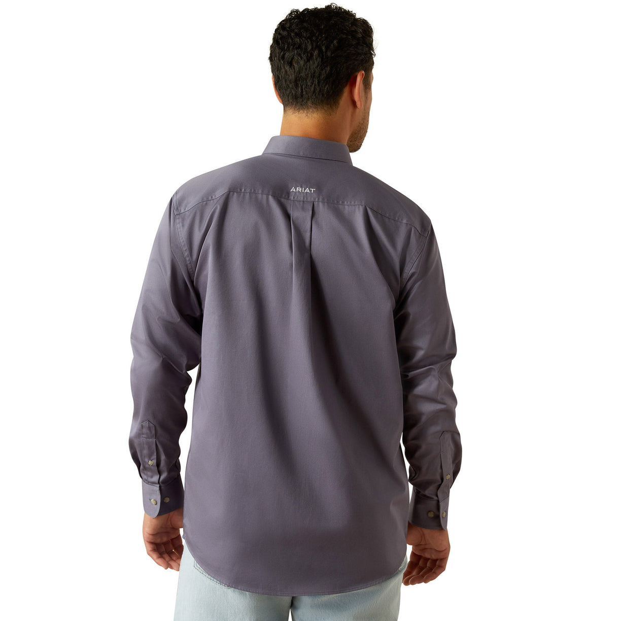 Man wearing a gray shirt on a white background