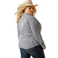 Woman wearing a striped shirt, jeans, and a cowboy hat on a white background