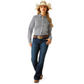 Woman wearing a gray shirt, blue jeans, and a cowboy hat on a white background