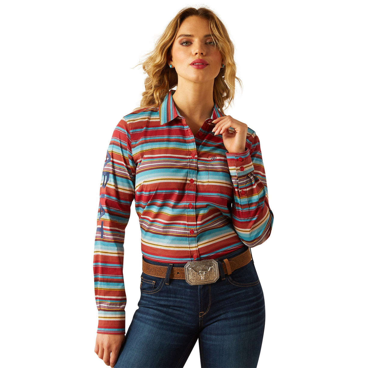 Woman wearing a colorful striped shirt and jeans on a white background