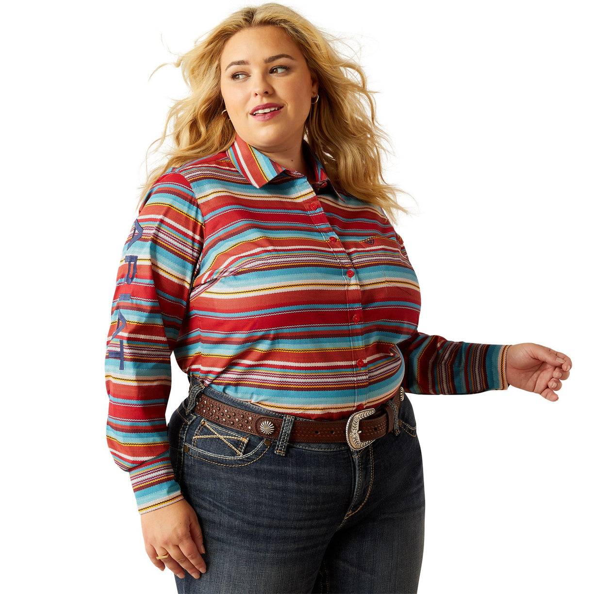 Woman wearing a colorful striped shirt and jeans on a white background