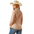 Woman wearing a striped shirt and cowboy hat on a white background
