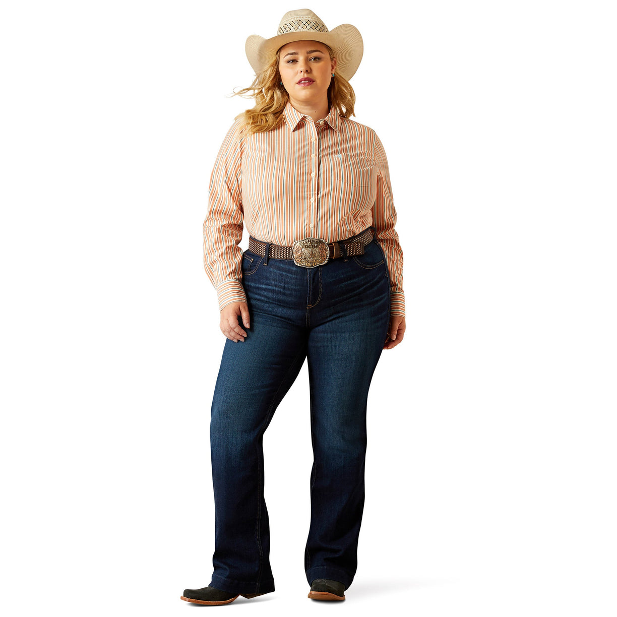 Woman wearing a cowboy hat, striped shirt, and jeans on a white background