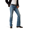 Person wearing blue jeans on a white background