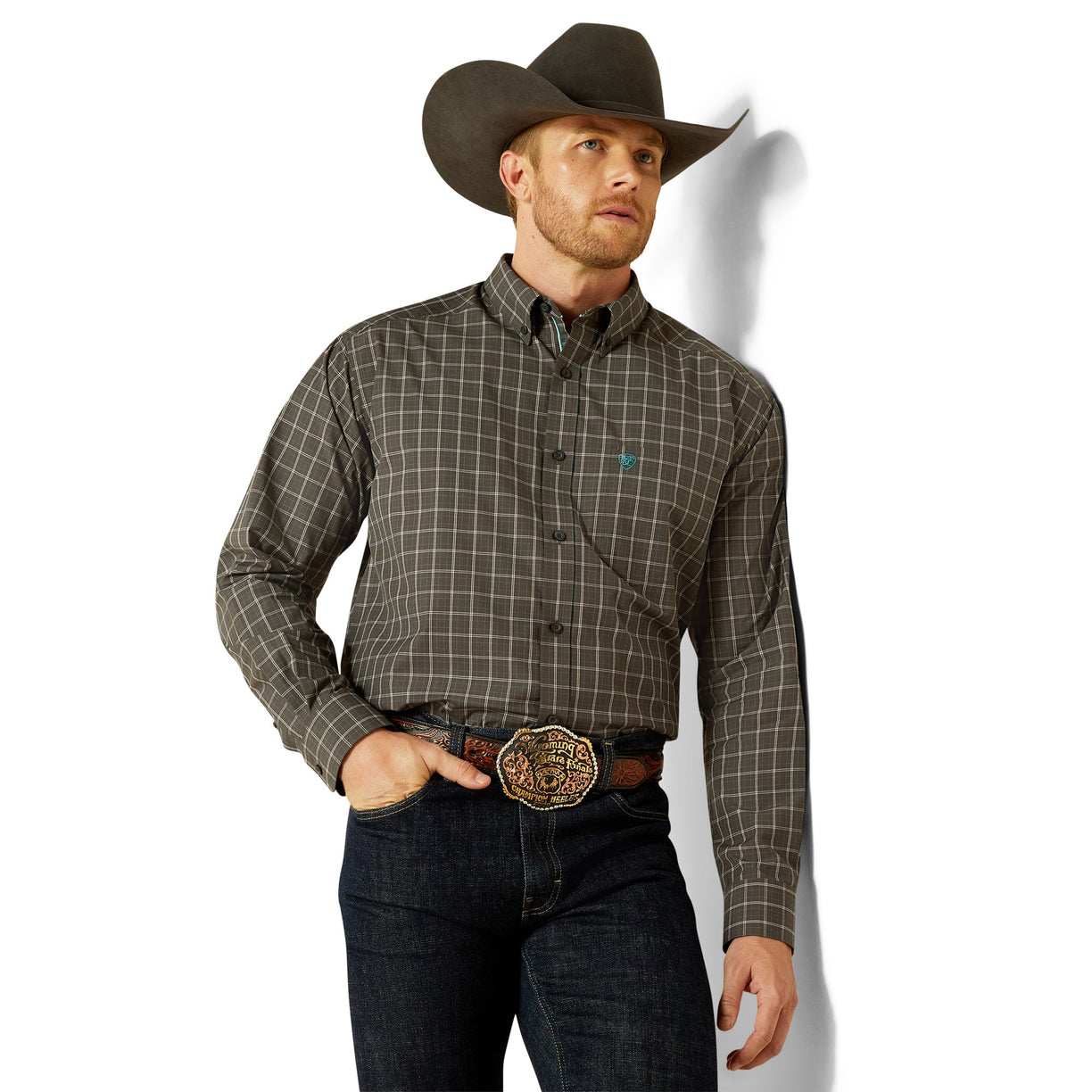 Man wearing a plaid shirt, jeans, and a cowboy hat on a white background