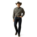Man wearing a plaid shirt, jeans, and a cowboy hat on a white background