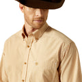 Man wearing a checkered shirt and cowboy hat on a white background