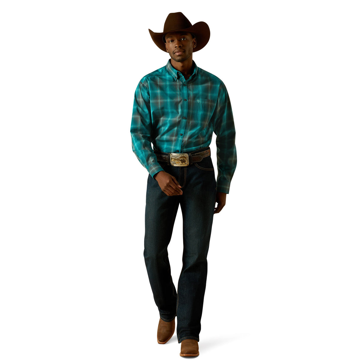 Man wearing a turquoise plaid shirt, dark jeans, and a brown cowboy hat on a white background