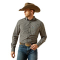 Man wearing a plaid shirt, jeans, and a cowboy hat on a white background