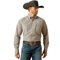Man wearing a plaid shirt, jeans, and a cowboy hat on a white background