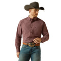 Man wearing a brown checkered shirt, blue jeans, and a cowboy hat on a white background